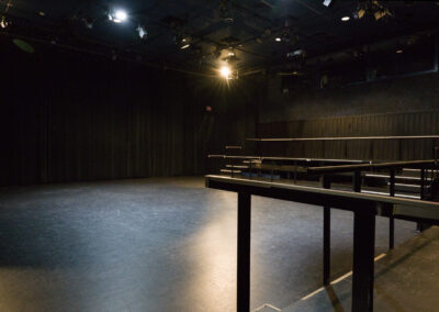 The Bette Condiotti Experimental Theatre with seat railings in the foreground and the floor beyond